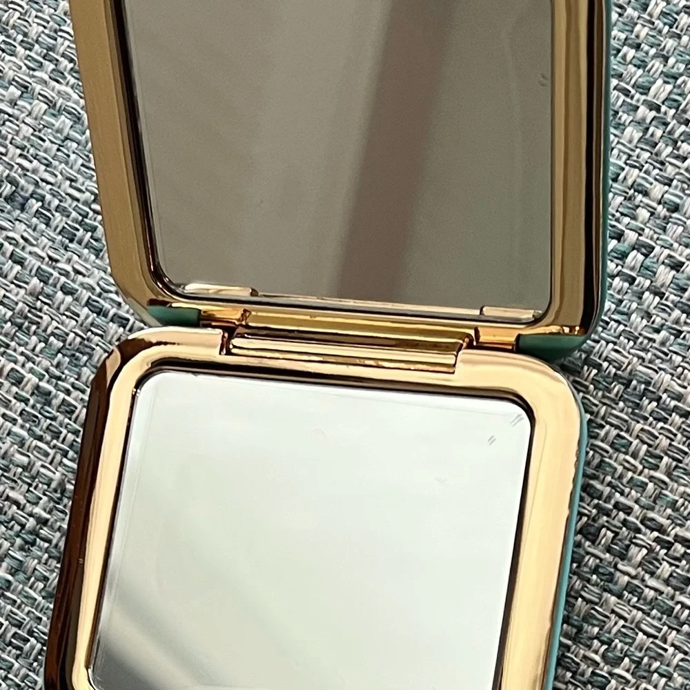 39. Miu Miu Turquoise Compact Case